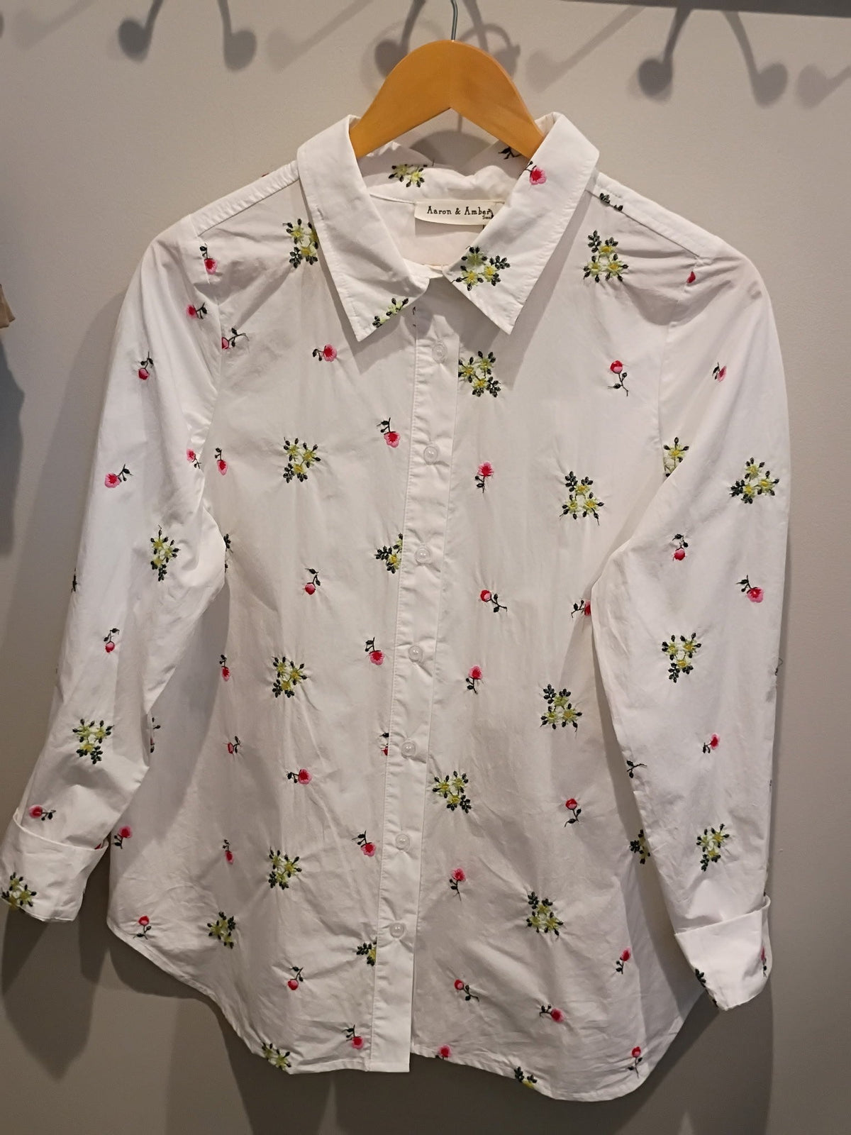 Aaron and Amber white floral embroidered button-up shirt, front view
