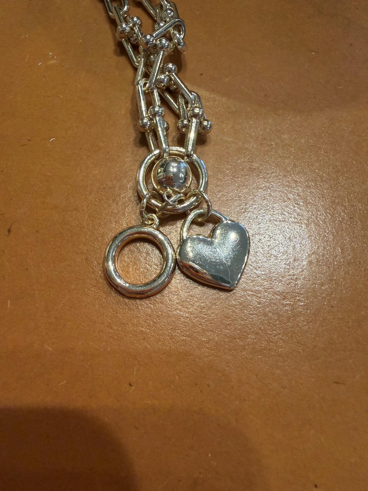 Silver chain bracelet with heart charm