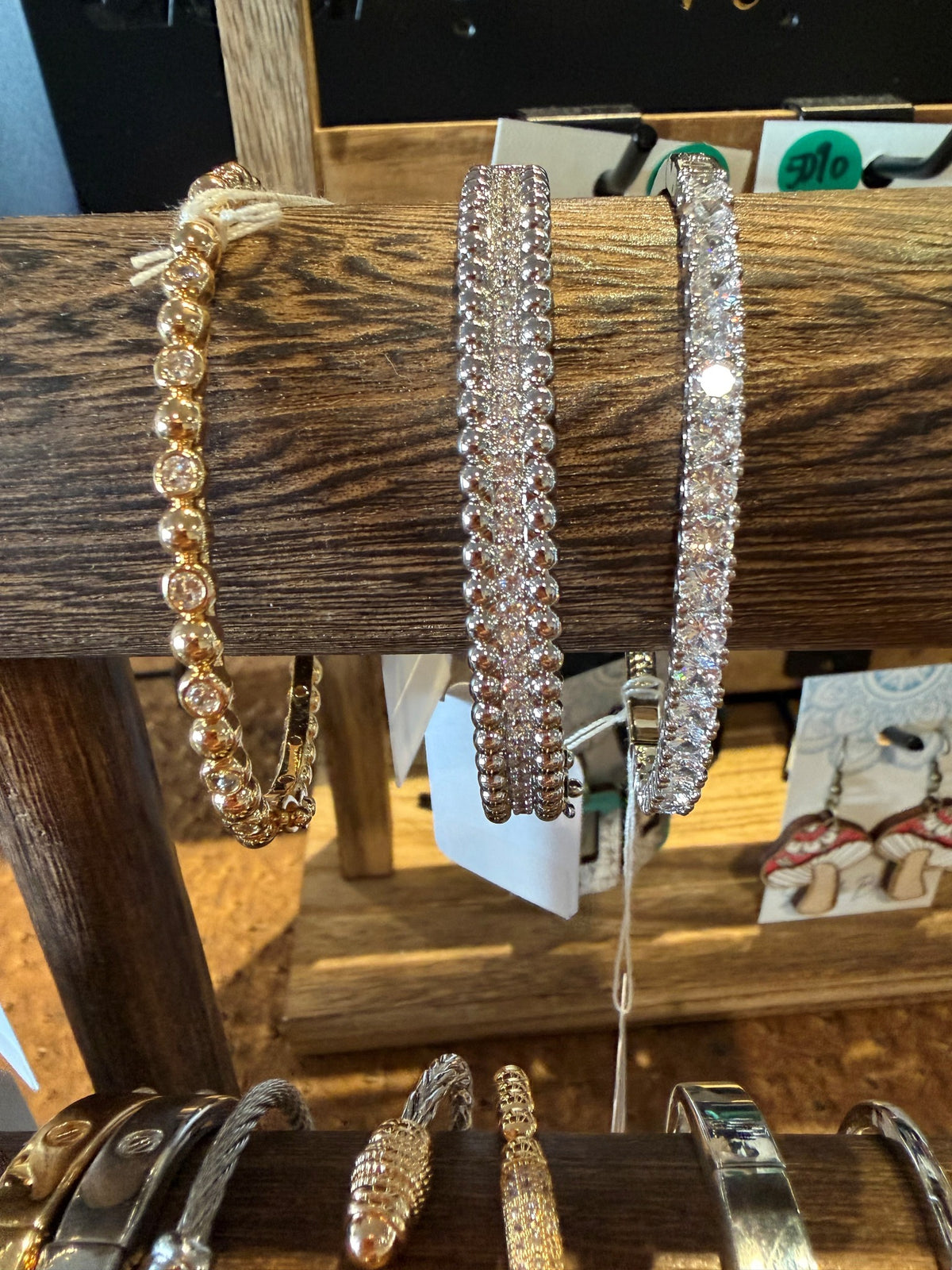 Sparkling bangle bracelets on jewelry display