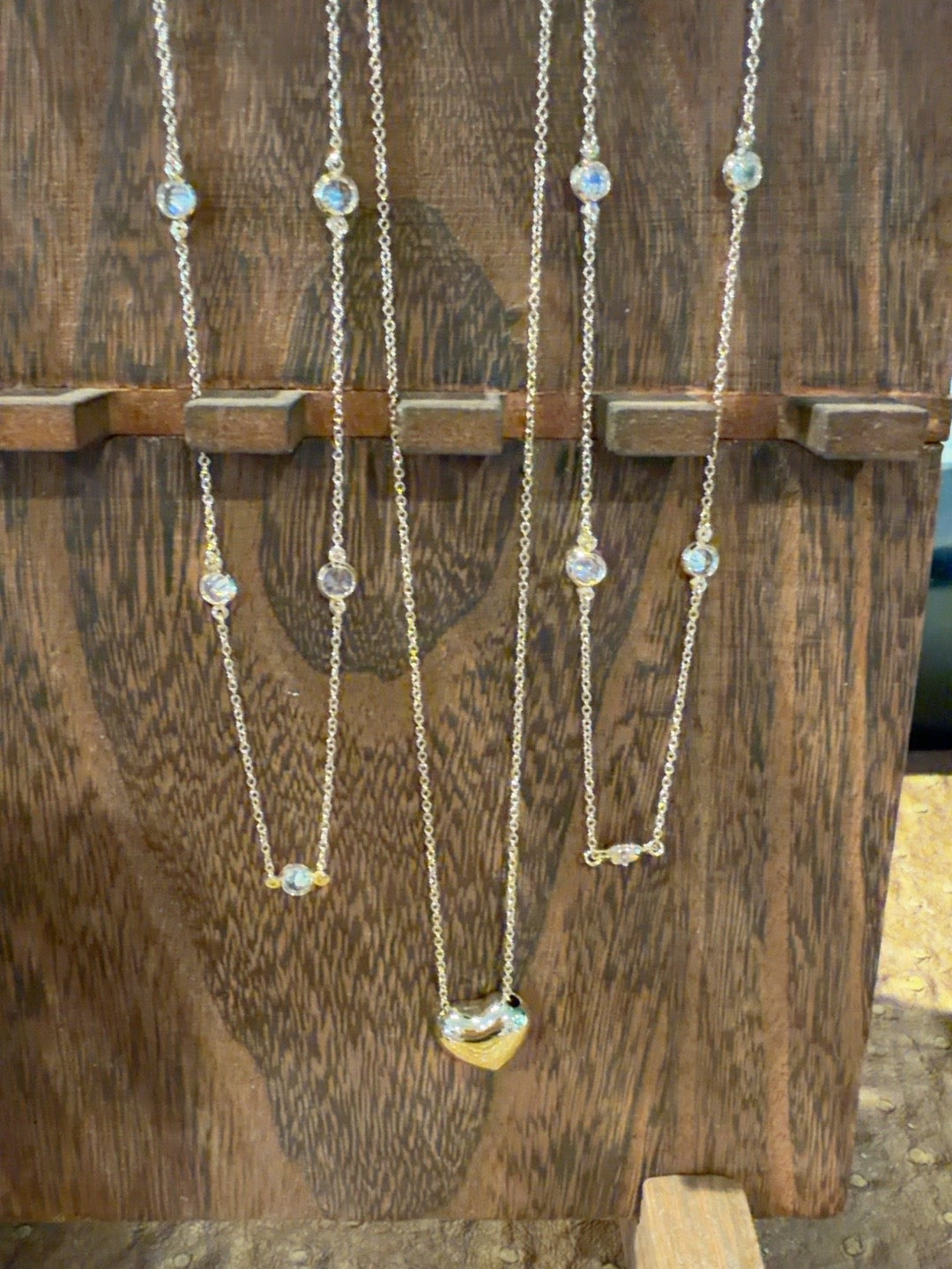 Gold fine chain necklaces with crystal accents and heart pendant